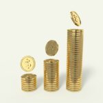 Stacks of gold coins representing financial concepts